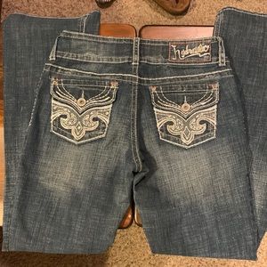 Like new hydraulic slim boot cut jeans. No wear and tear hems are still intact.